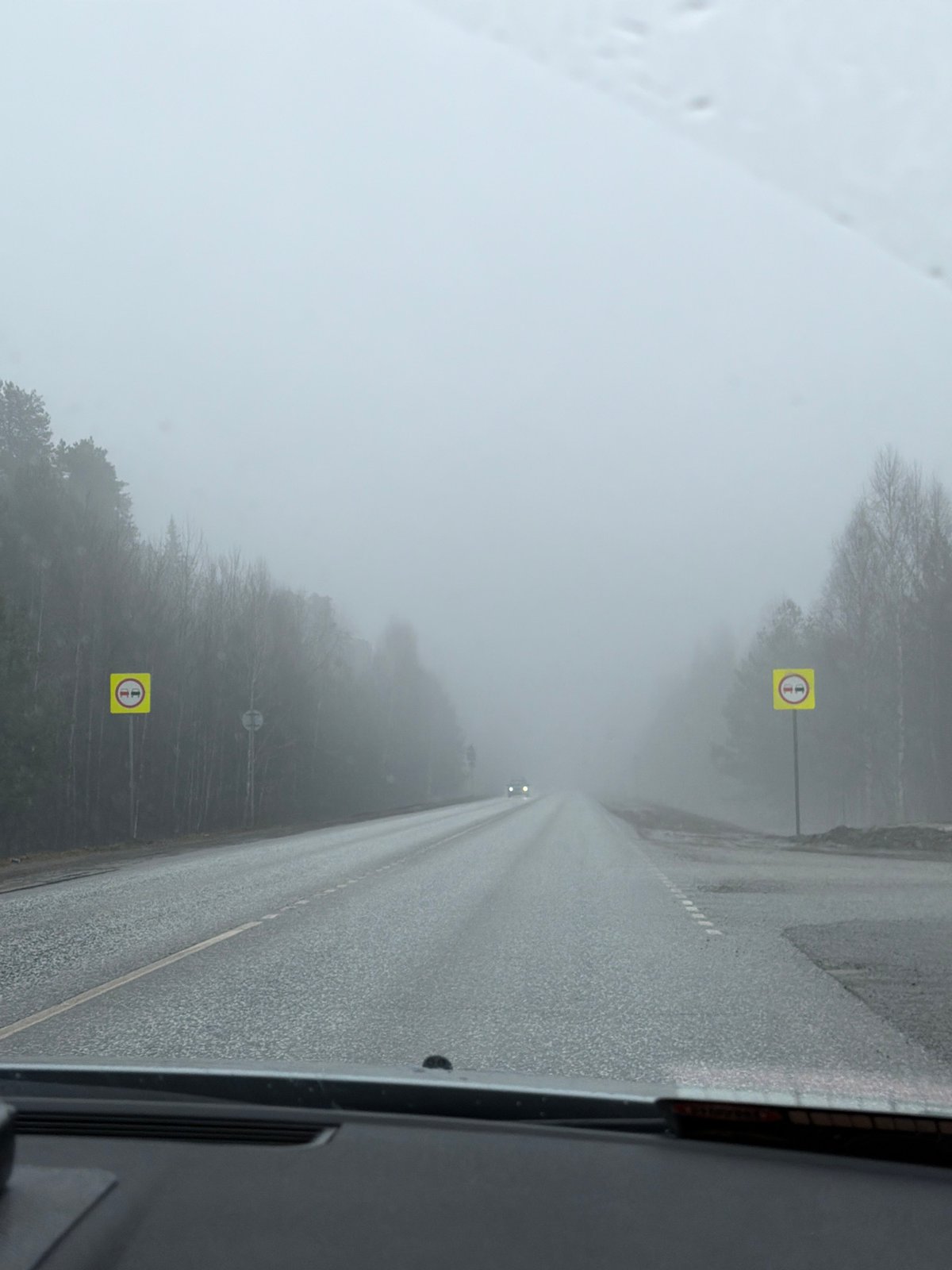 Motorist drives through heavy fog, wet conditions near Chaikovsky