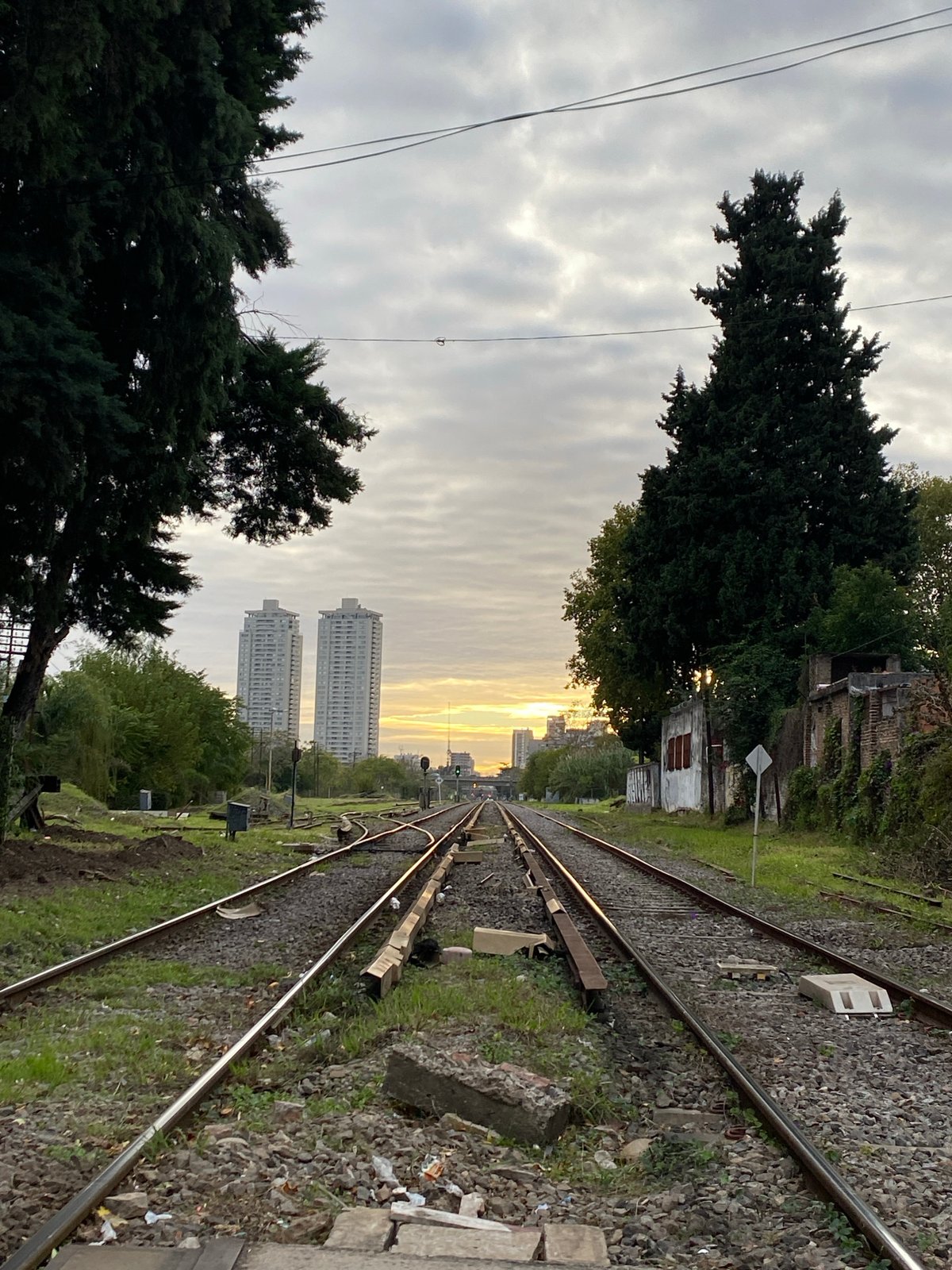 Railway tracks photographed during golden hour in Buenos Aires