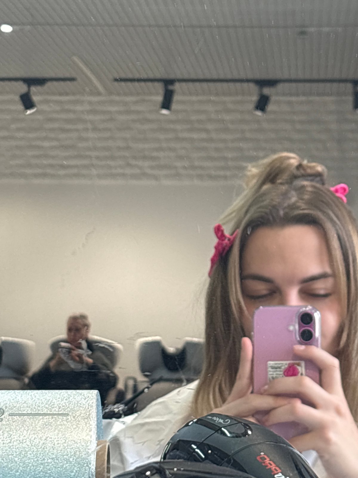 Woman takes mirror selfie in Krasnoyarsk, Russia