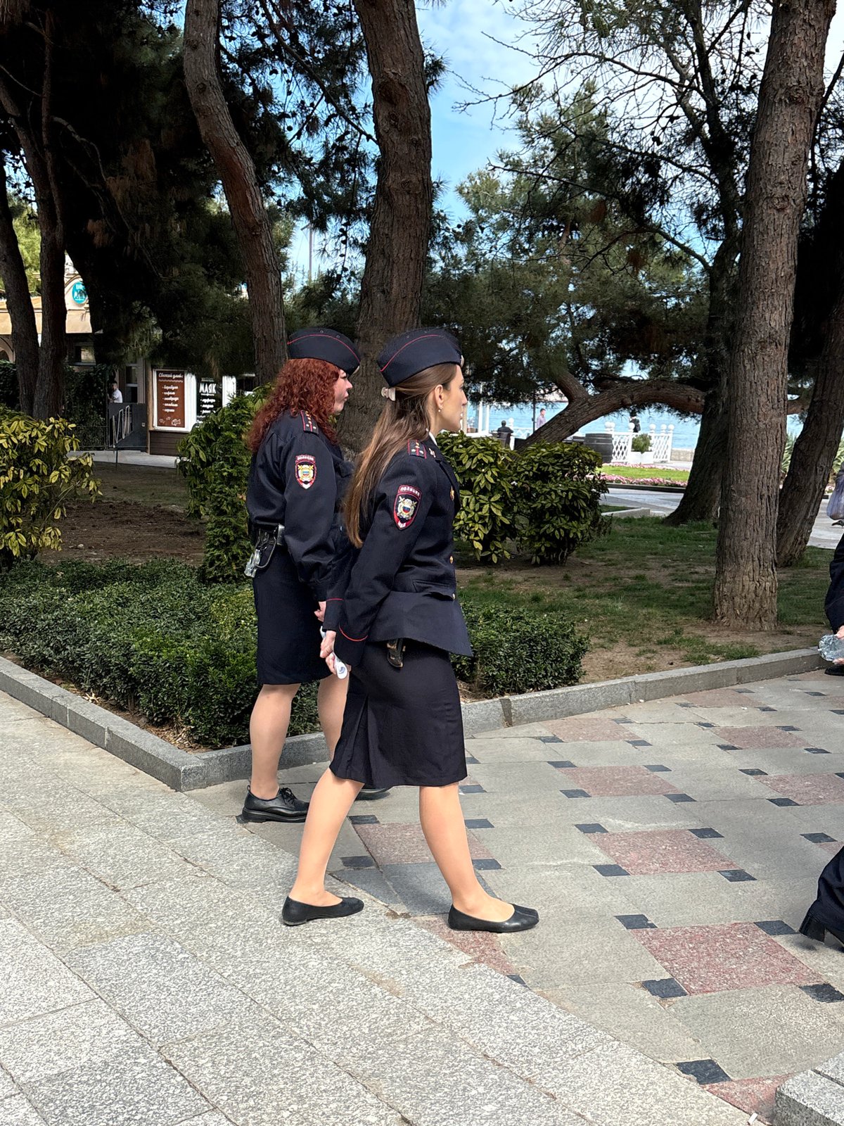 Everyday life unfolds on Yalta's busy waterfront promenade