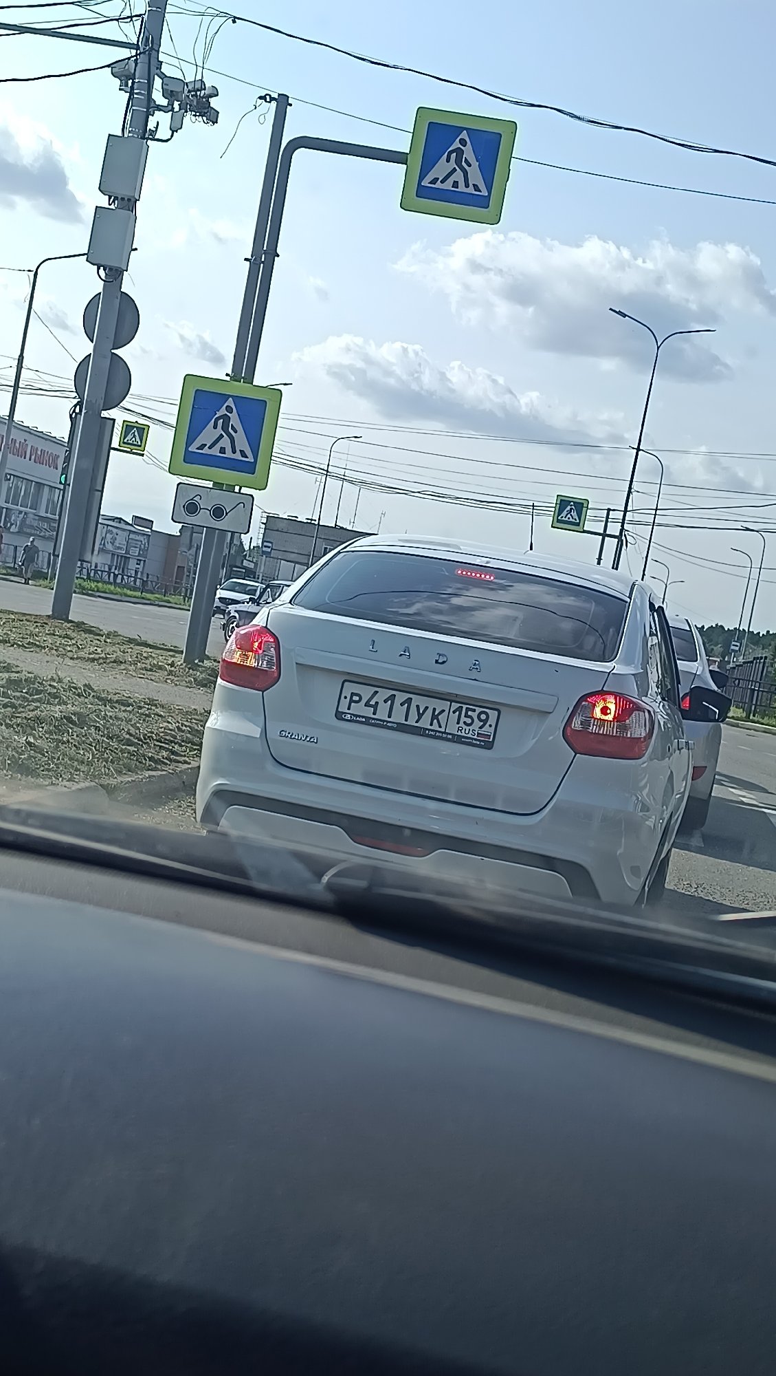 Driving through Chaikovsky streets on a summer afternoon