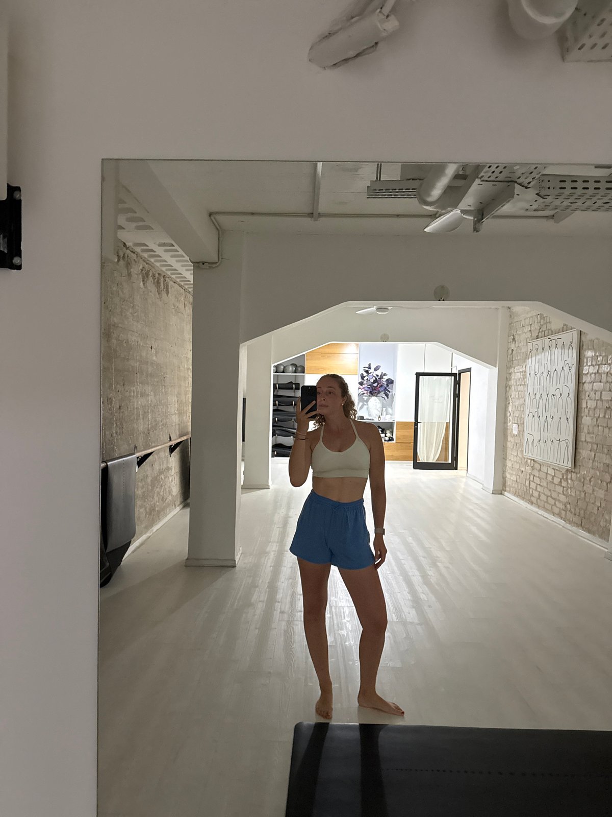 Gym selfie in a bright Tel Aviv fitness studio