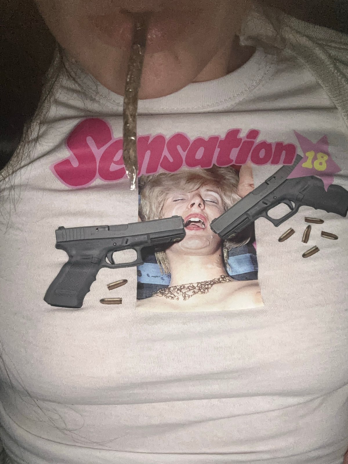 Person photographed wearing graphic t-shirt in Buenos Aires bedroom