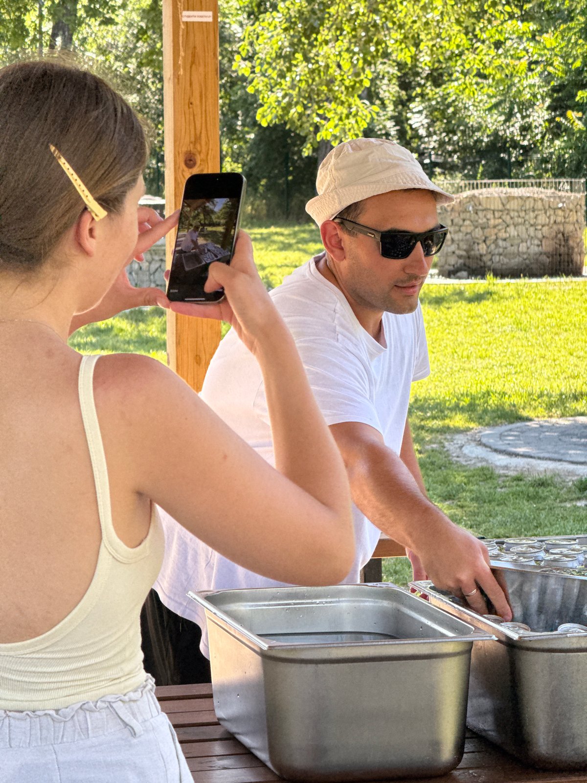Outdoor food and drink preparation gathering documented in Belgrade suburb