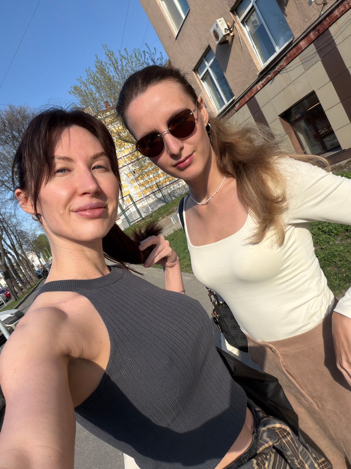 Two women take selfie outdoors in Perm, Russia