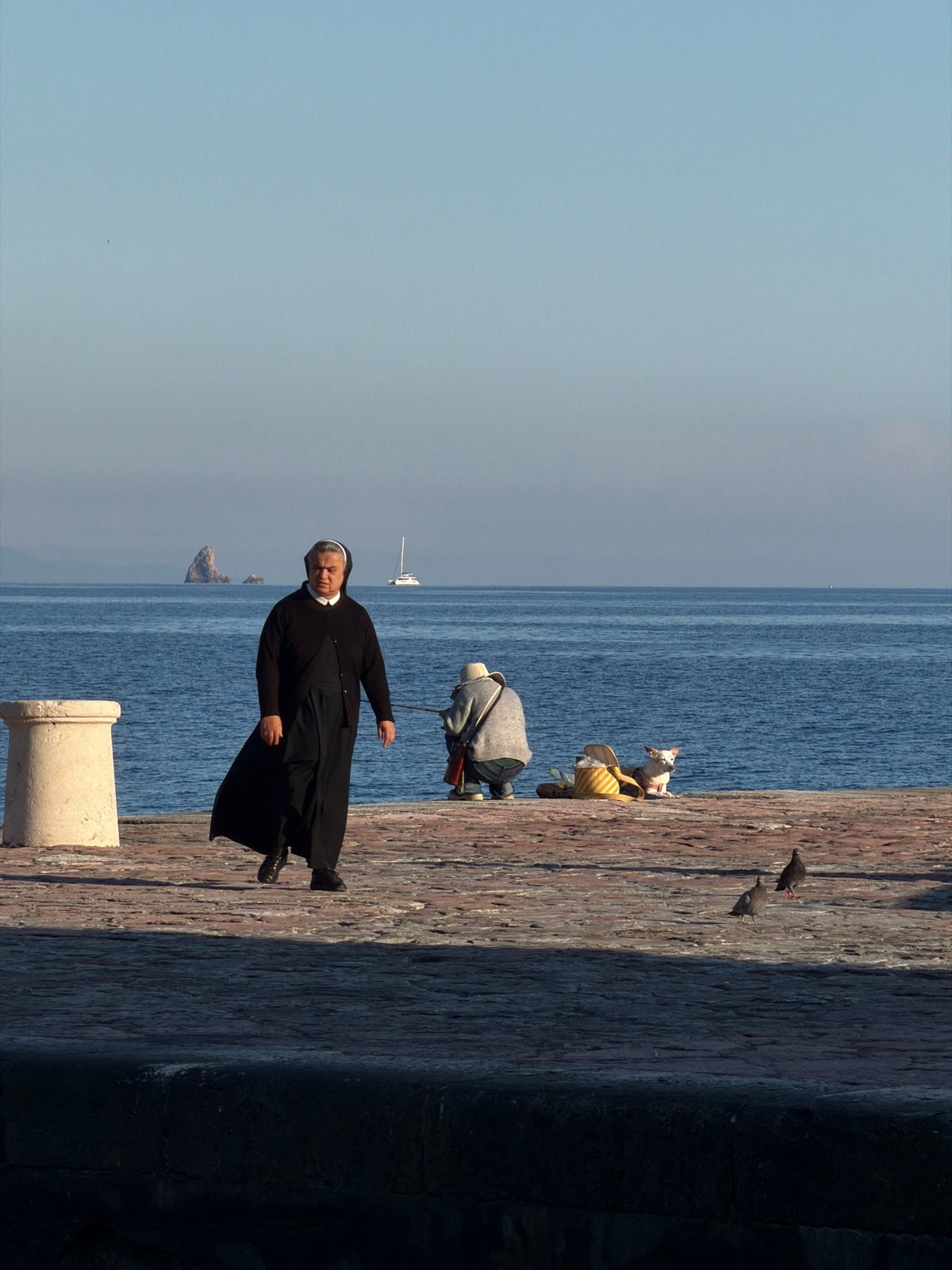 Afternoon seaside leisure activities documented in Petrovac, Montenegro