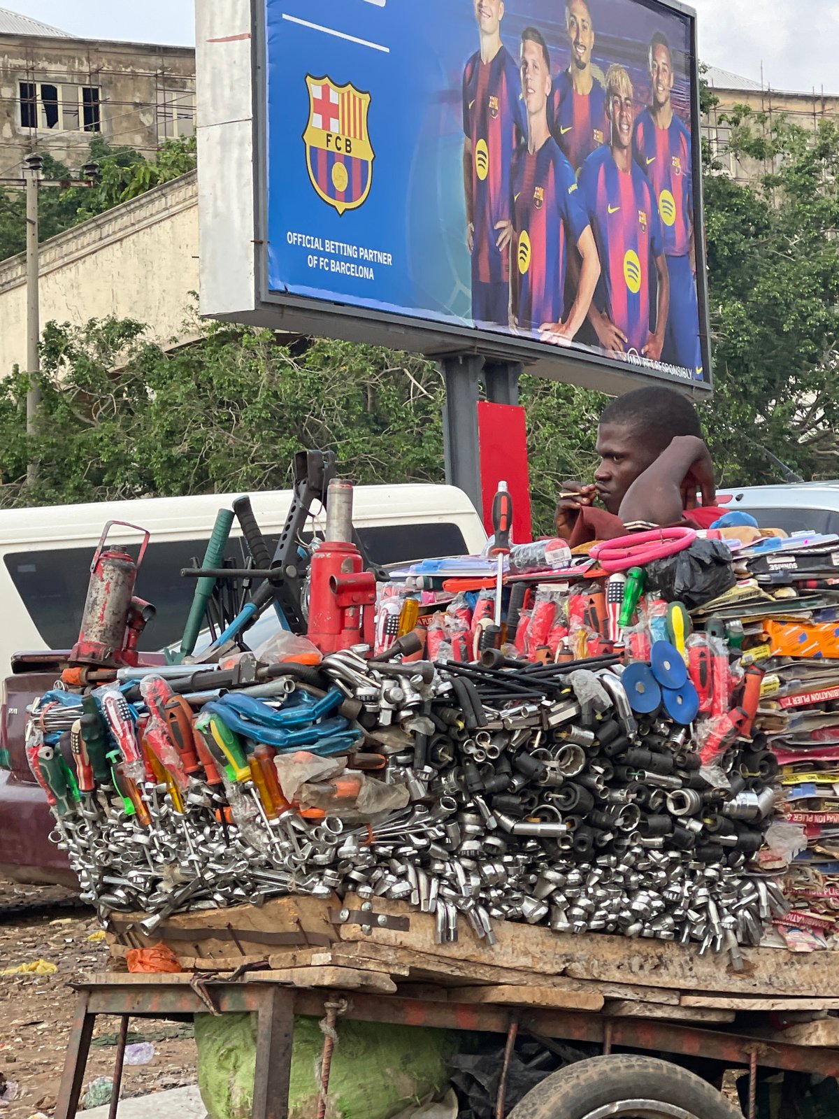Street commerce and daily movement in central Abuja