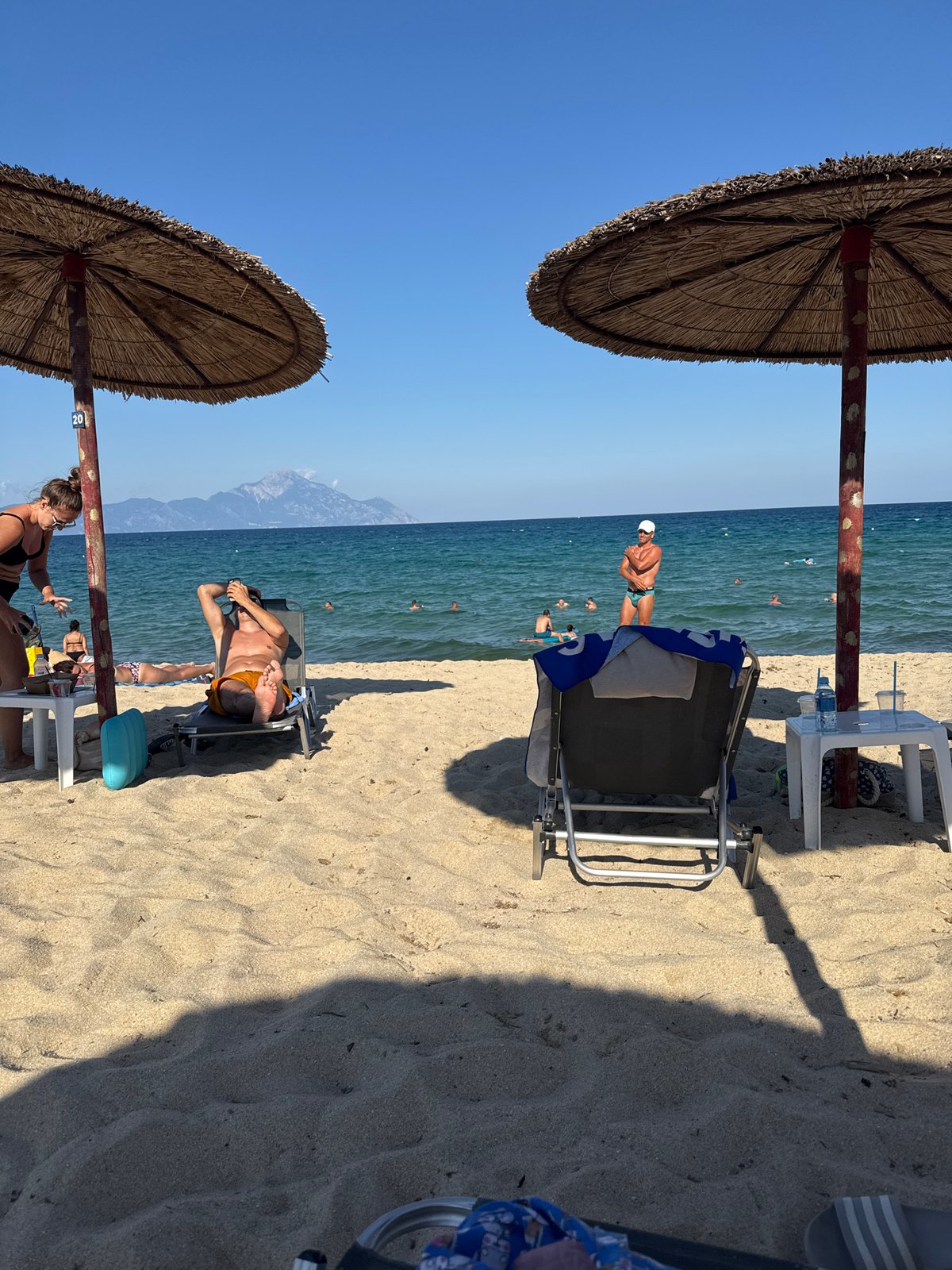 Lazy afternoon on a quiet beach in Toroni, Greece.