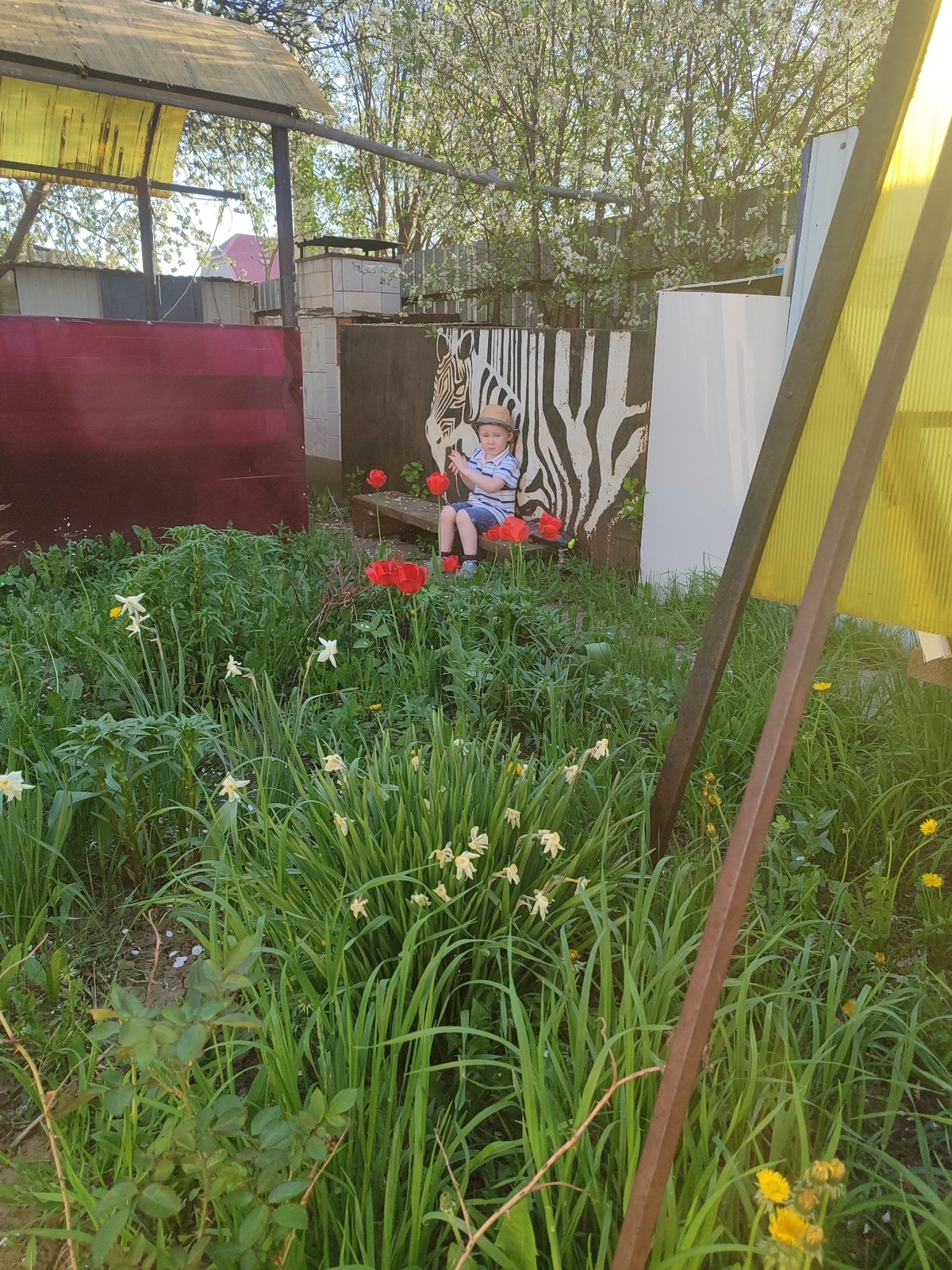 Family enjoys quiet afternoon playtime in Russian backyard