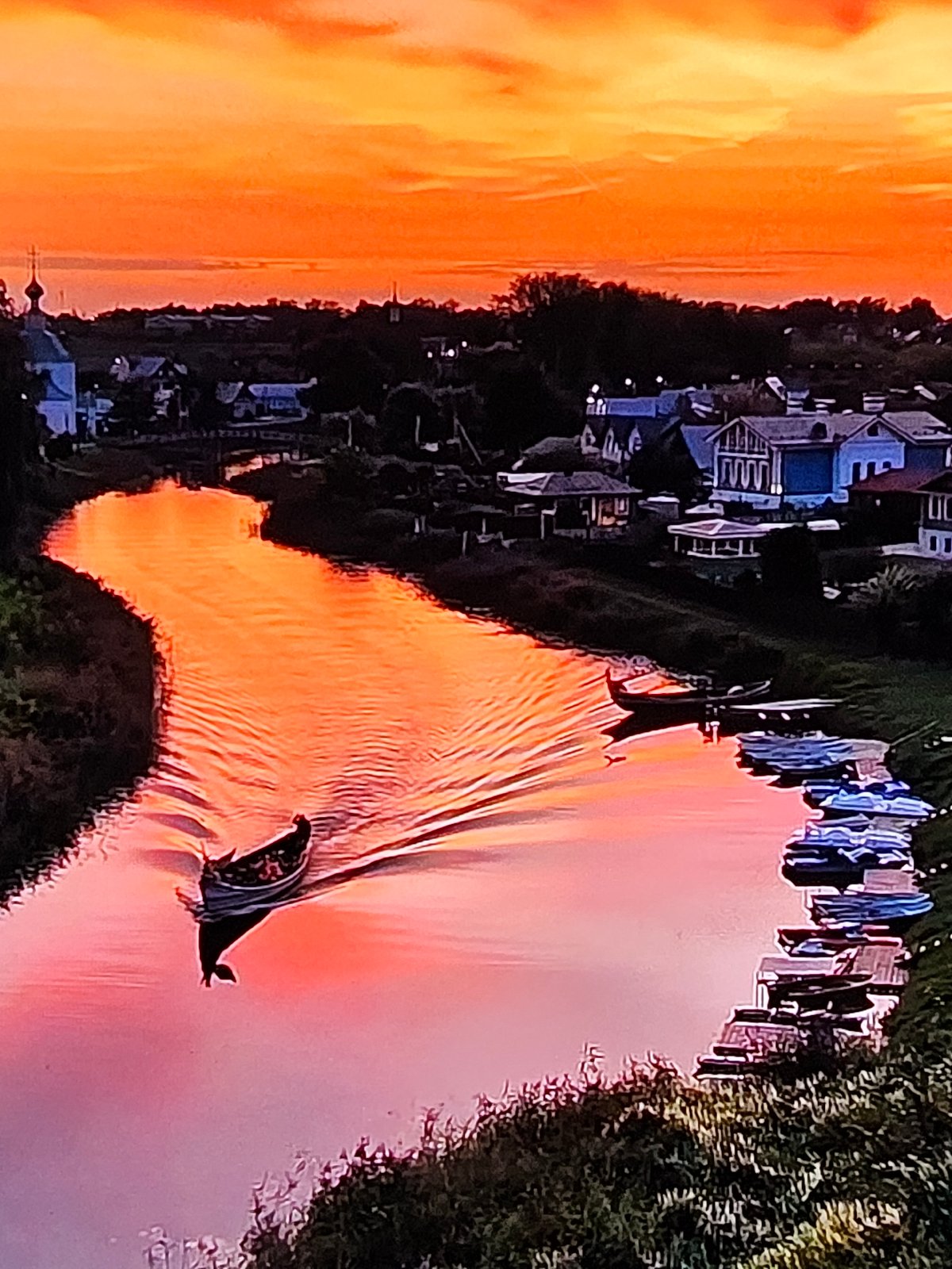 Vladimir's historic skyline at golden hour, churches and river views
