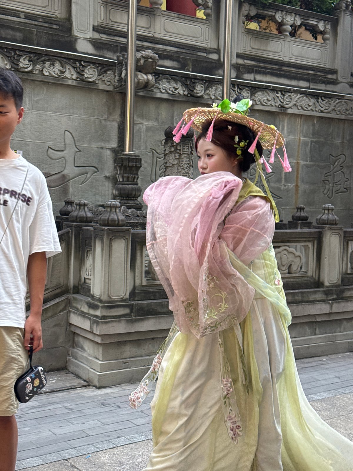 Hanfu and street fashion outside a Chinese Fashion storefront in Yuzhong