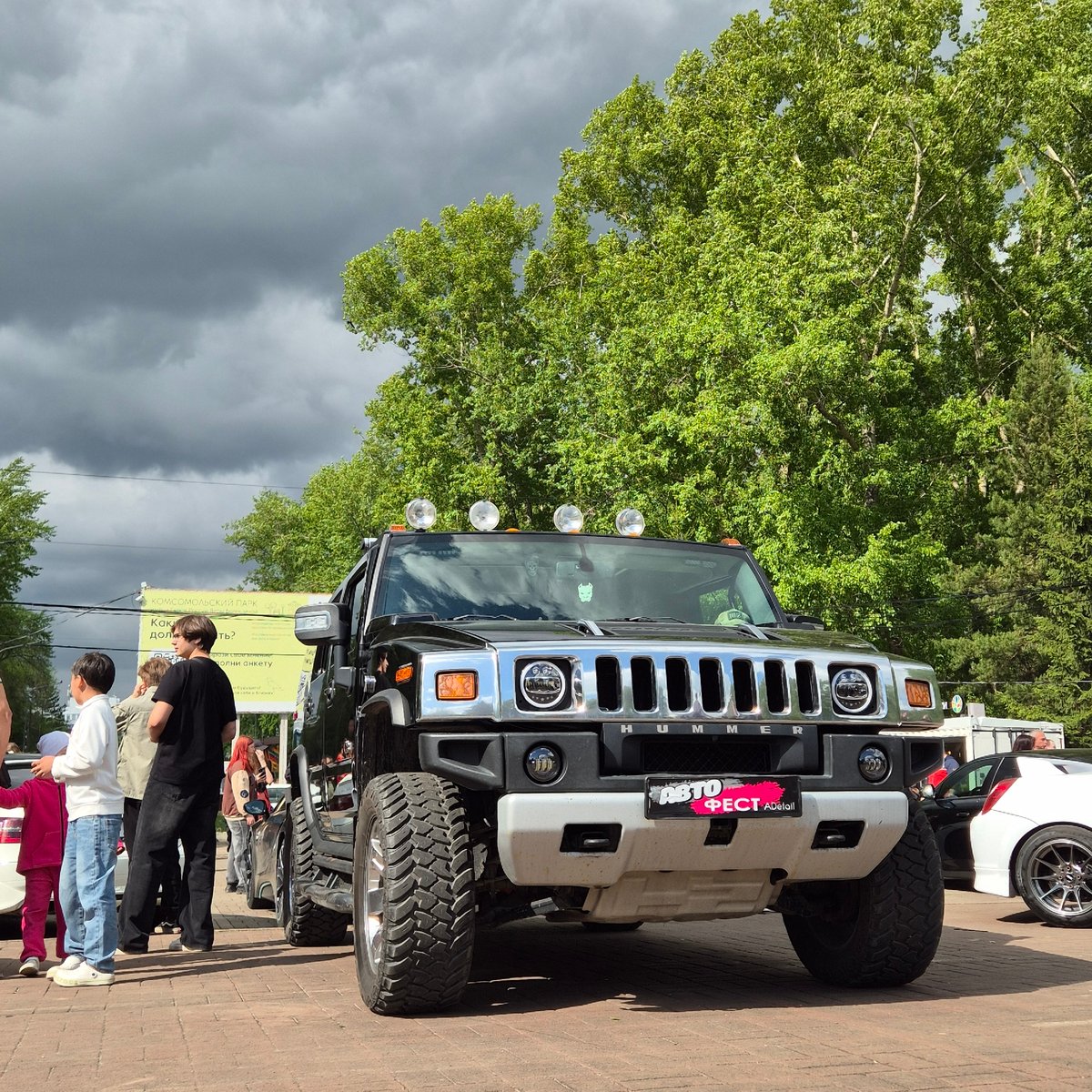 Car enthusiasts gather at Komsomolsky Park in Kemerovo, Russia