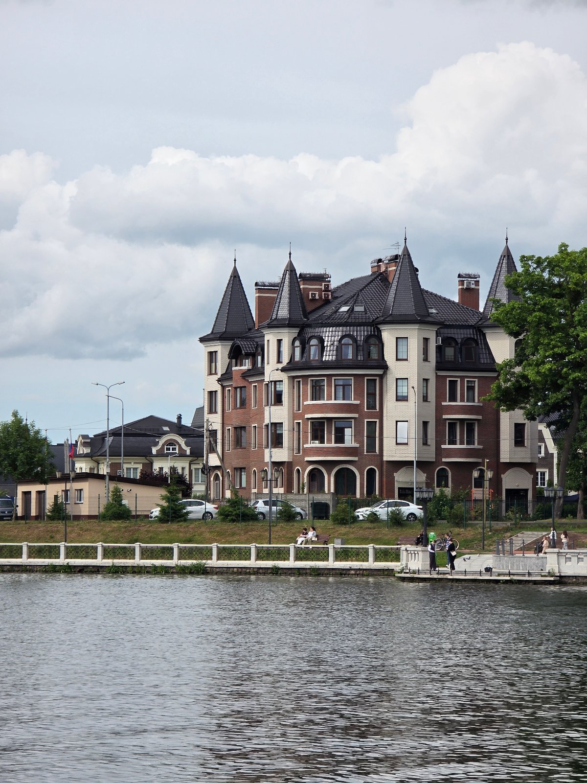 Tourist documents Kaliningrad landmarks and architecture during afternoon walkabout