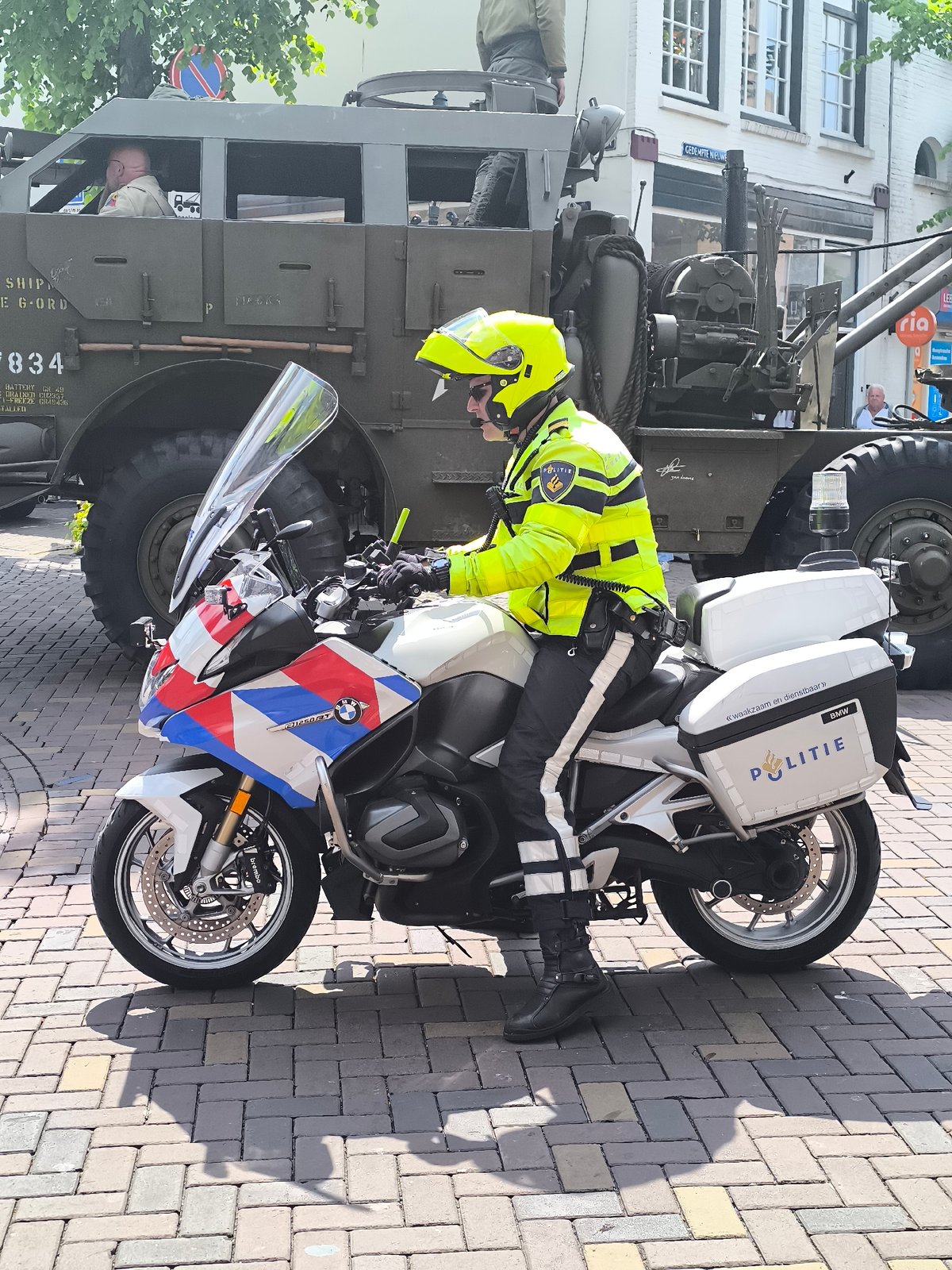 Canadian military convoy escorts through Alkmaar streets