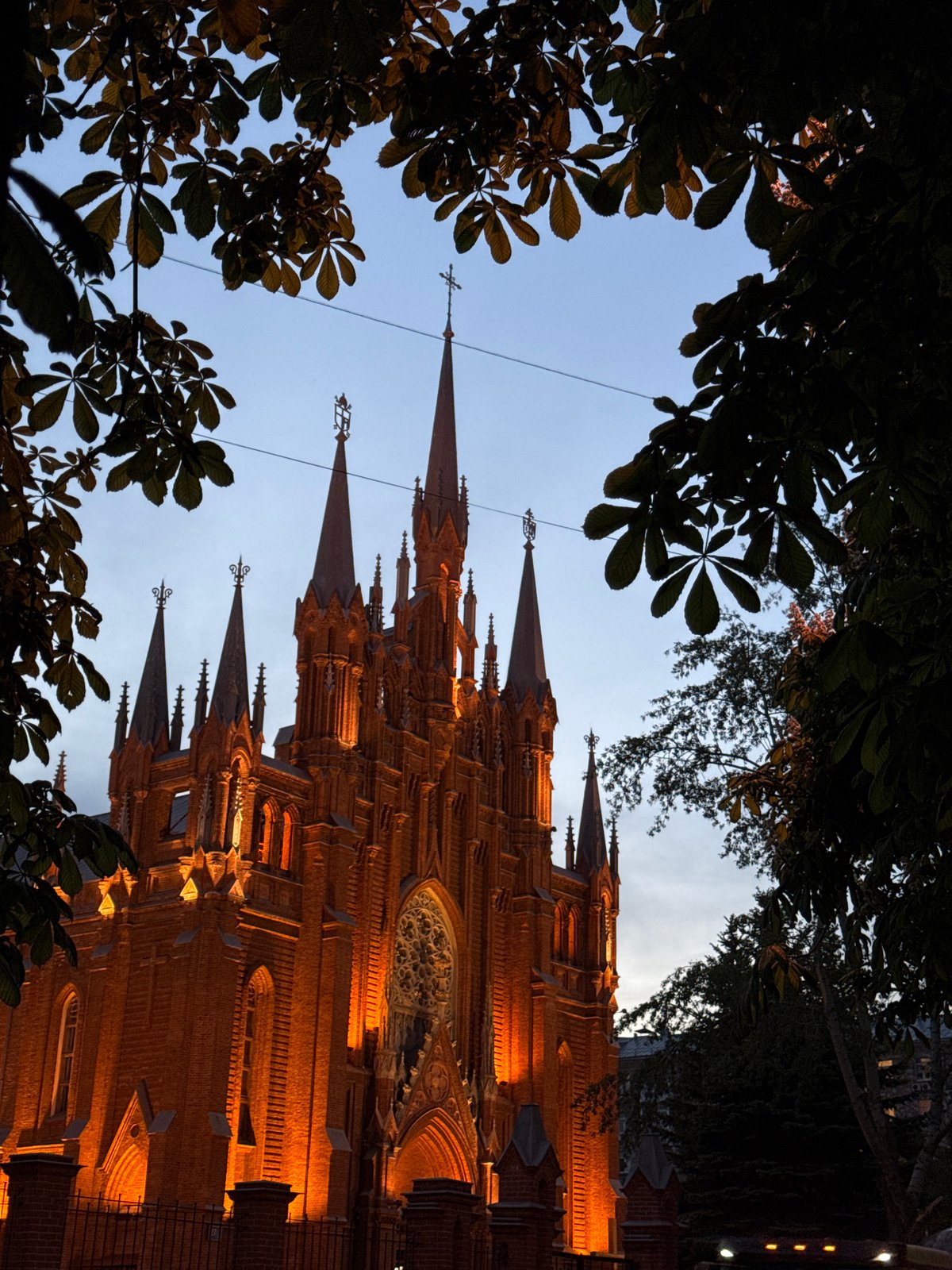Moscow Gothic churches illuminated at twilight captured by witness