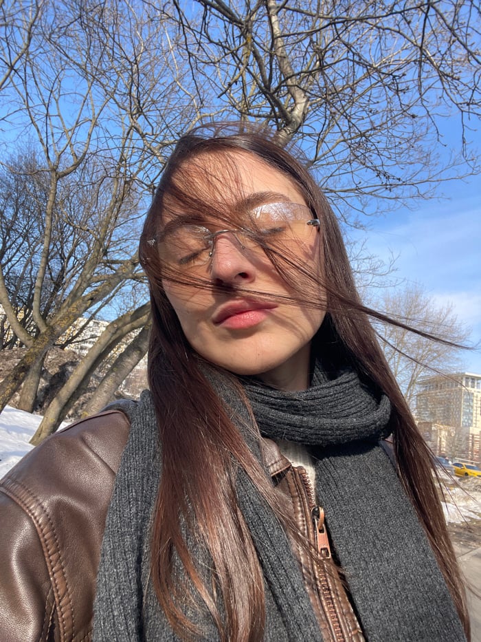 Woman documents morning walk through sunny Moscow neighborhoods