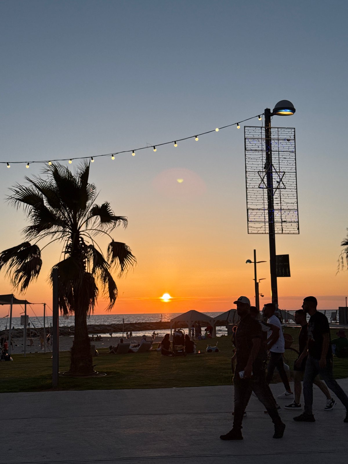 Sunset observed over Tel Aviv coastline Friday evening