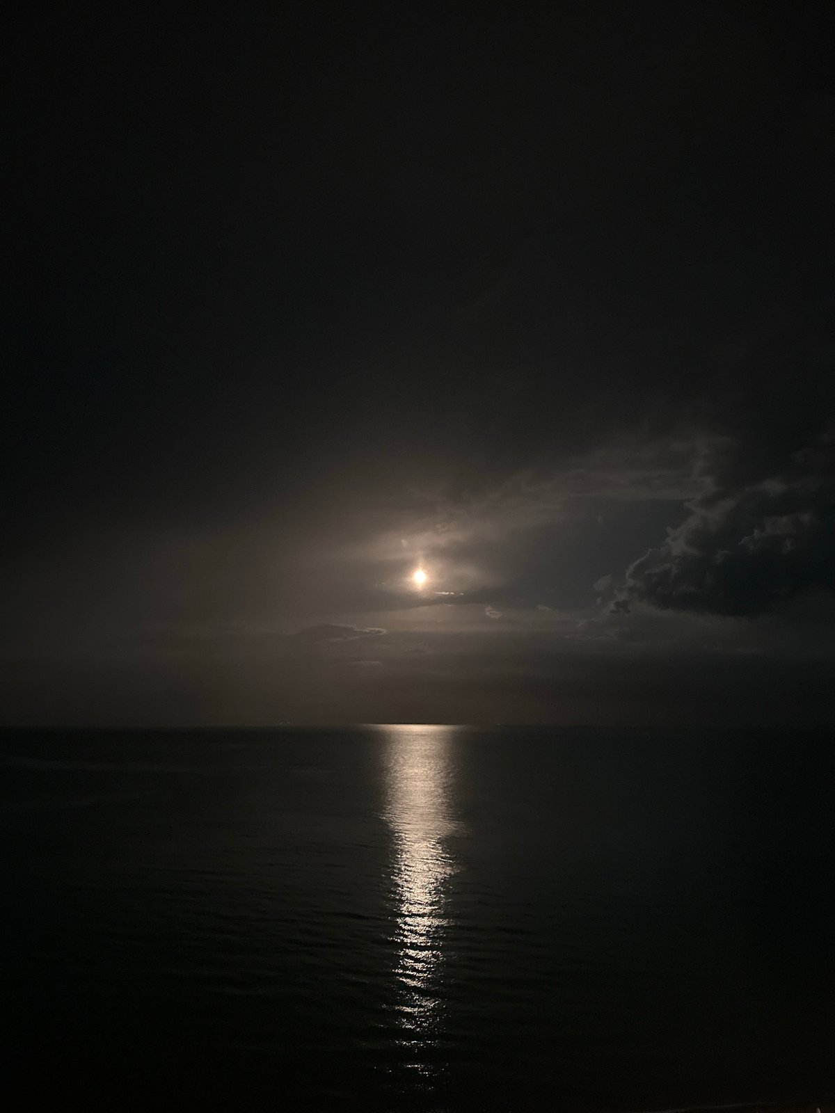 Nighttime waterfront scene captured in Nesebar, Bulgaria