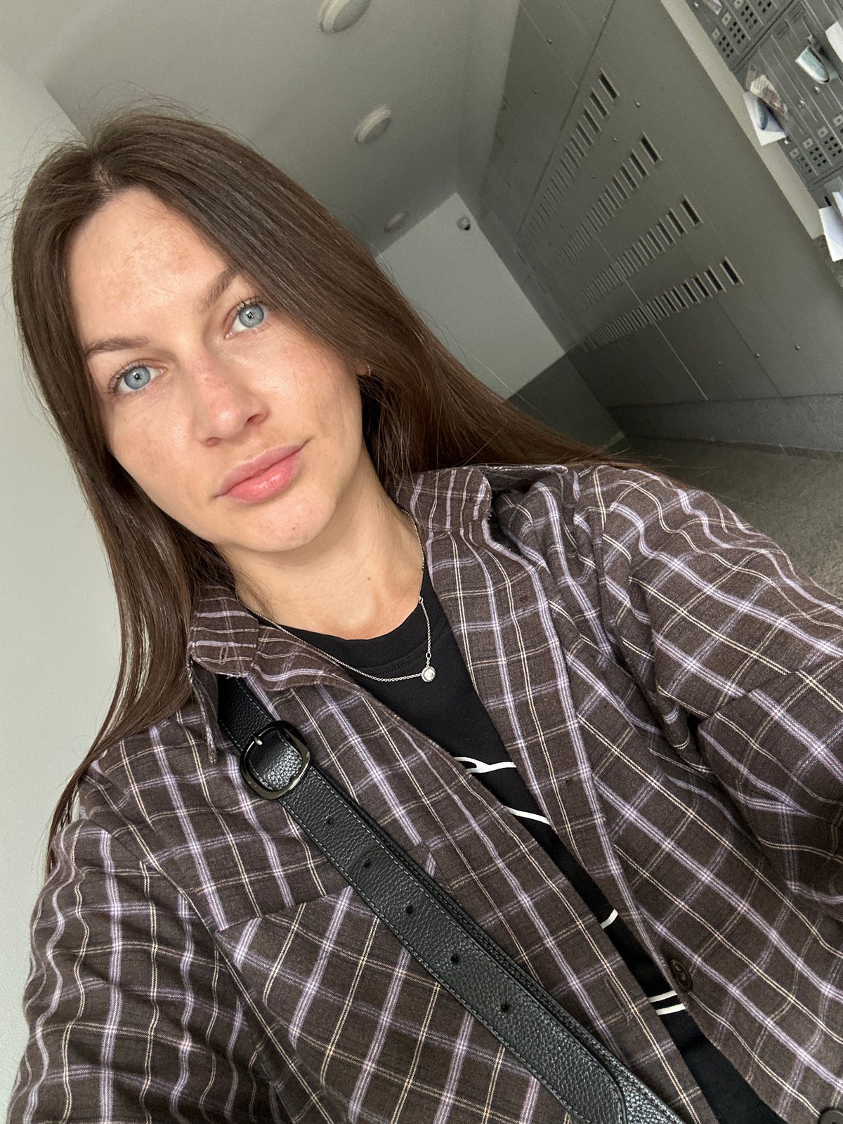 Woman takes selfies indoors in Lapčići, Montenegro