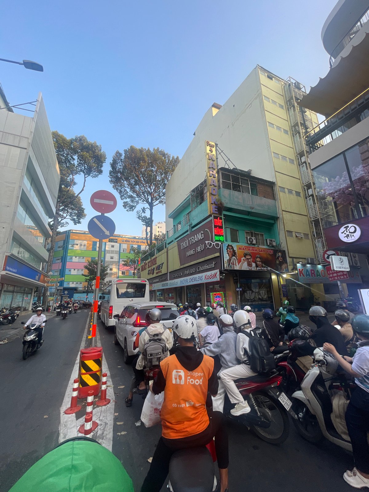 Busy motorbike traffic flows through Thủ Đức streets