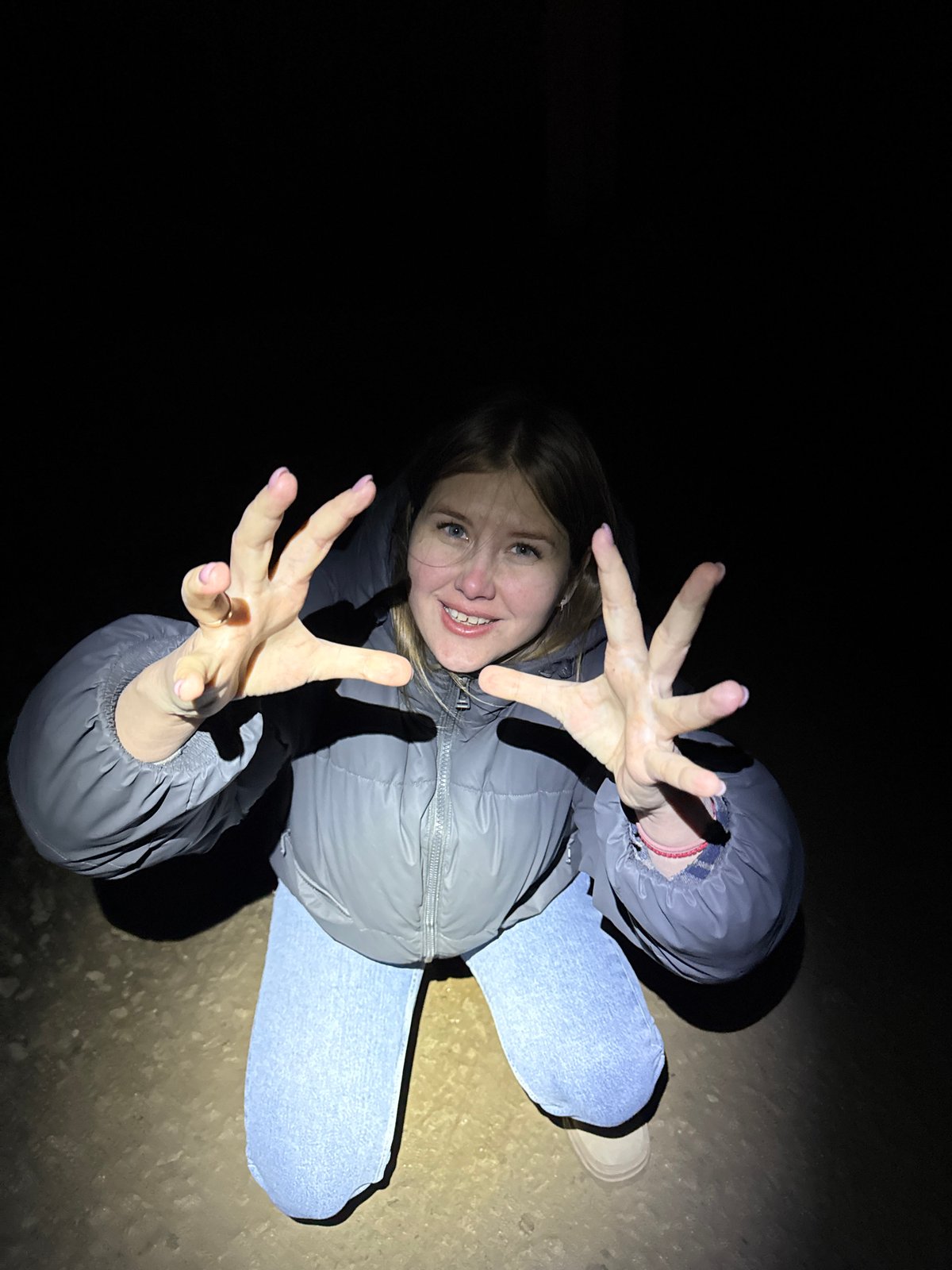 Woman photographed lying on ground in darkness, Горный Russia