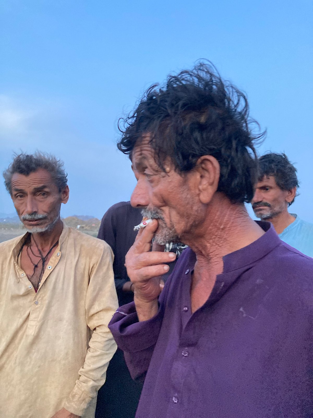 Rural gathering with rifles documented in Wayara, Pakistan