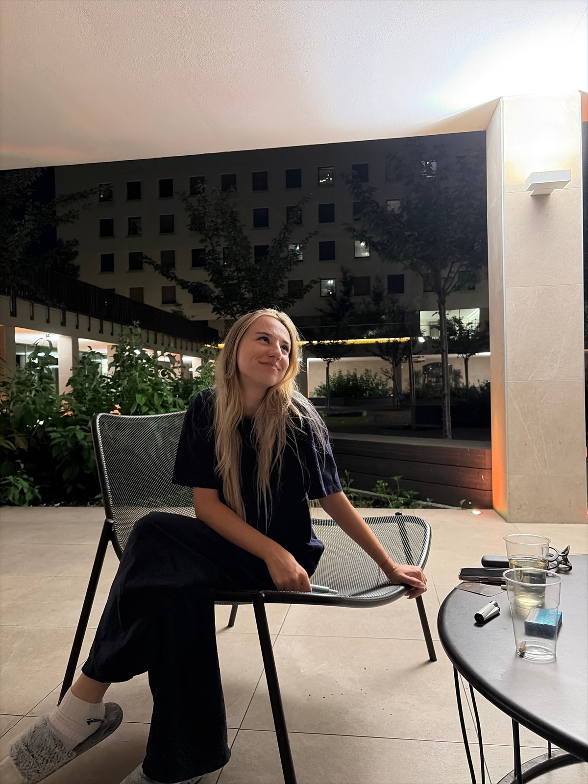 Evening in Milan: patio relaxation and elevator selfies