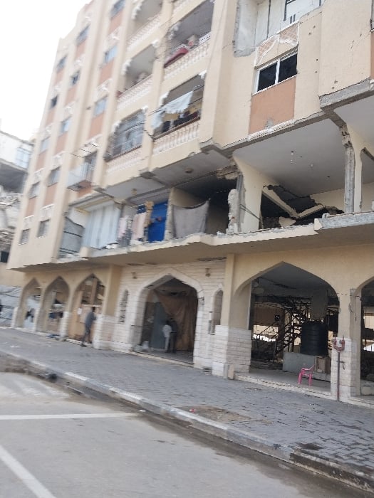 Extensive building damage documented across Khan Yunis during afternoon hours