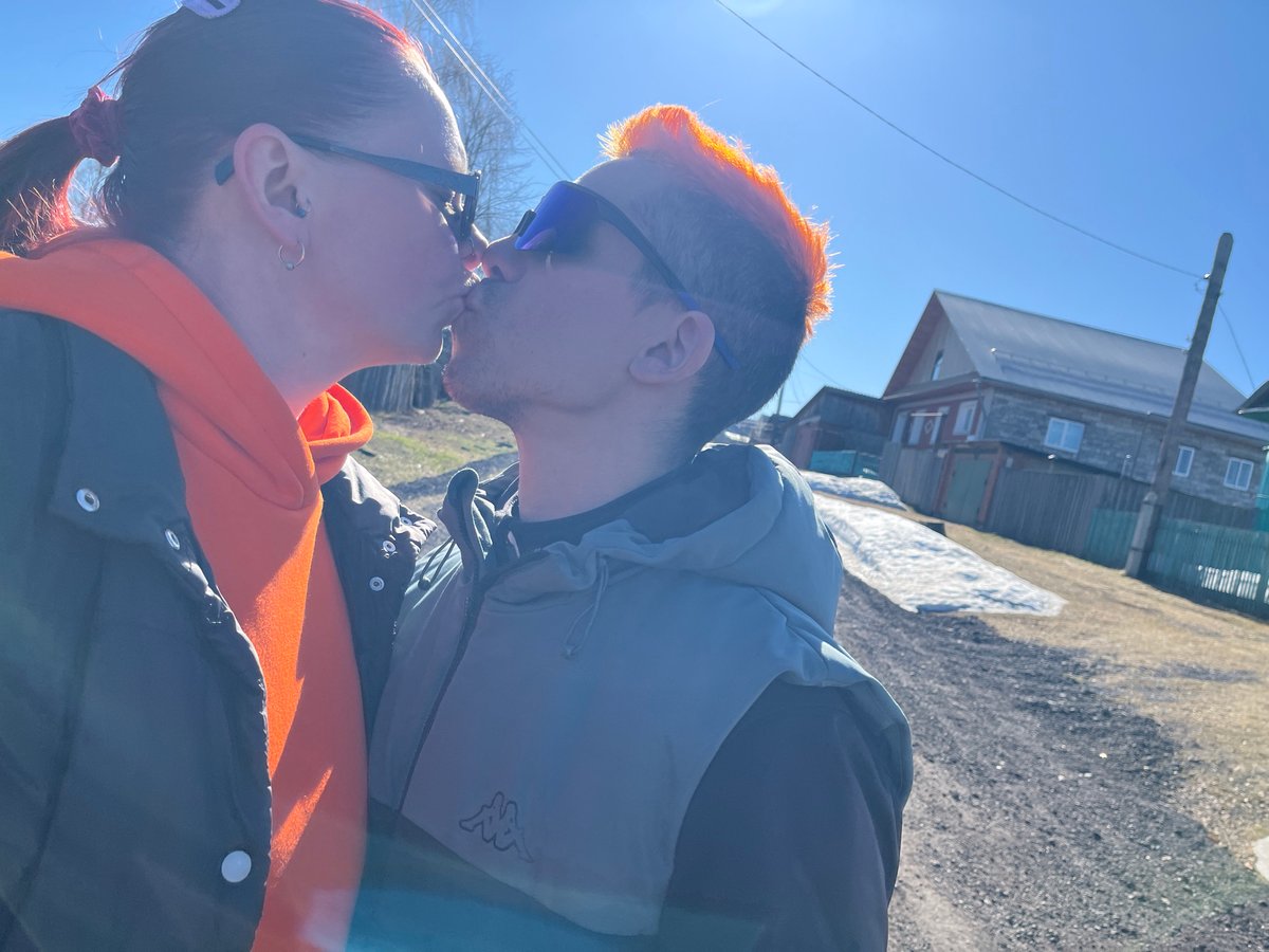 Orange-haired person walks dog, takes selfies in Chaikovsky, Russia