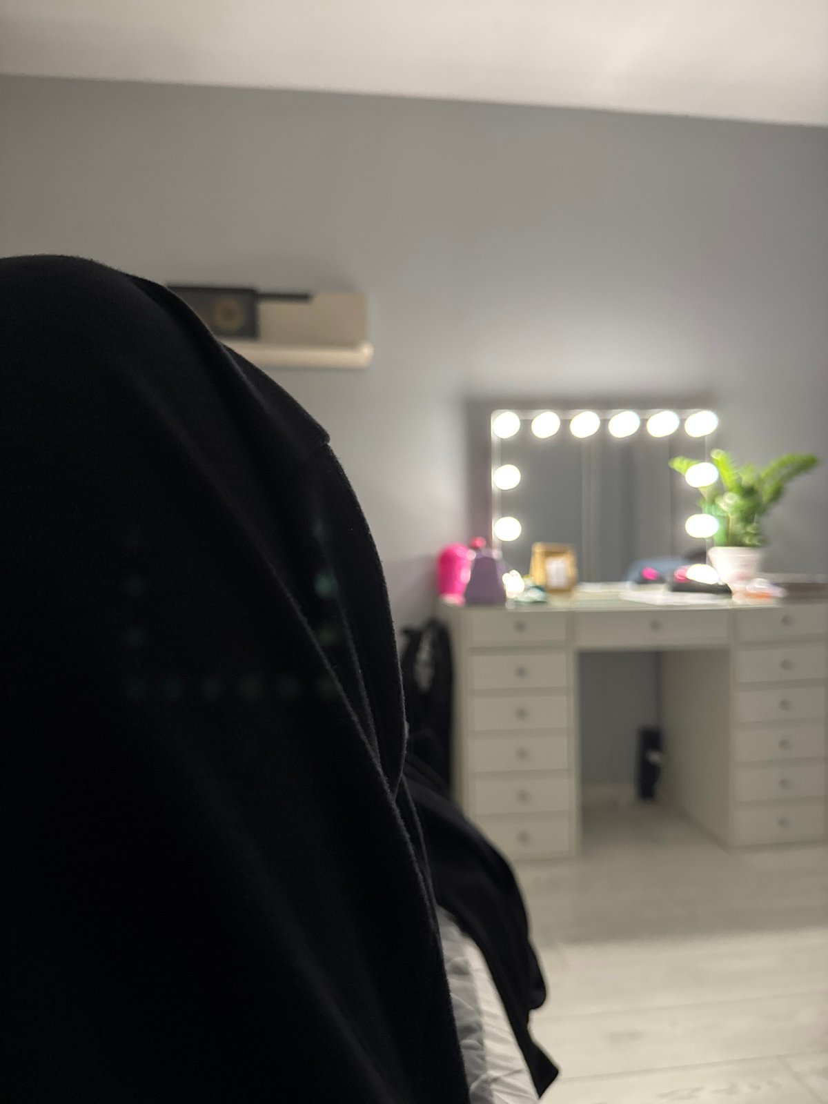 Bedroom interior with vanity mirror documented in Sofia
