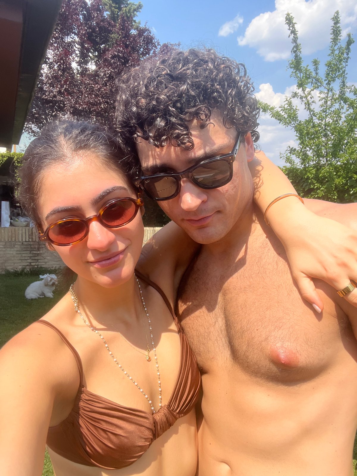 Outdoor barbecue gathering captured near Madrid swimming pool