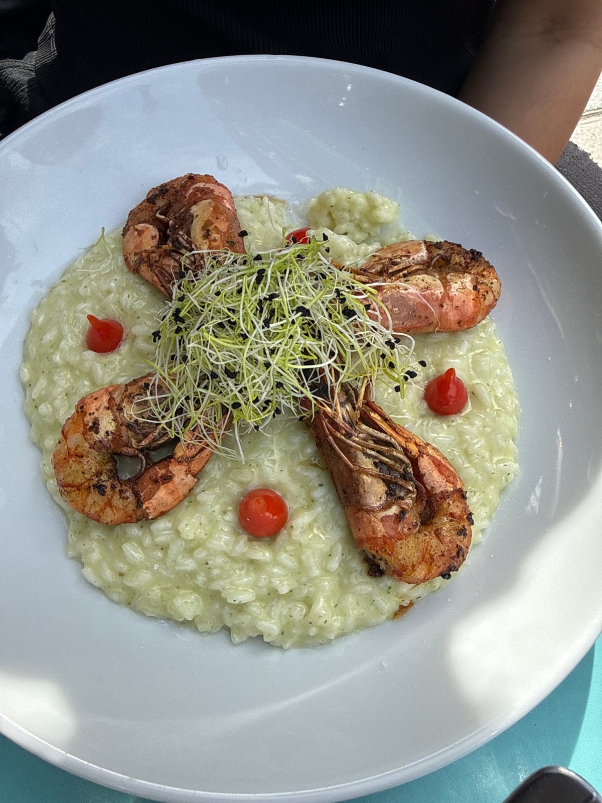 Risotto with prawns documented in Paris dining scene