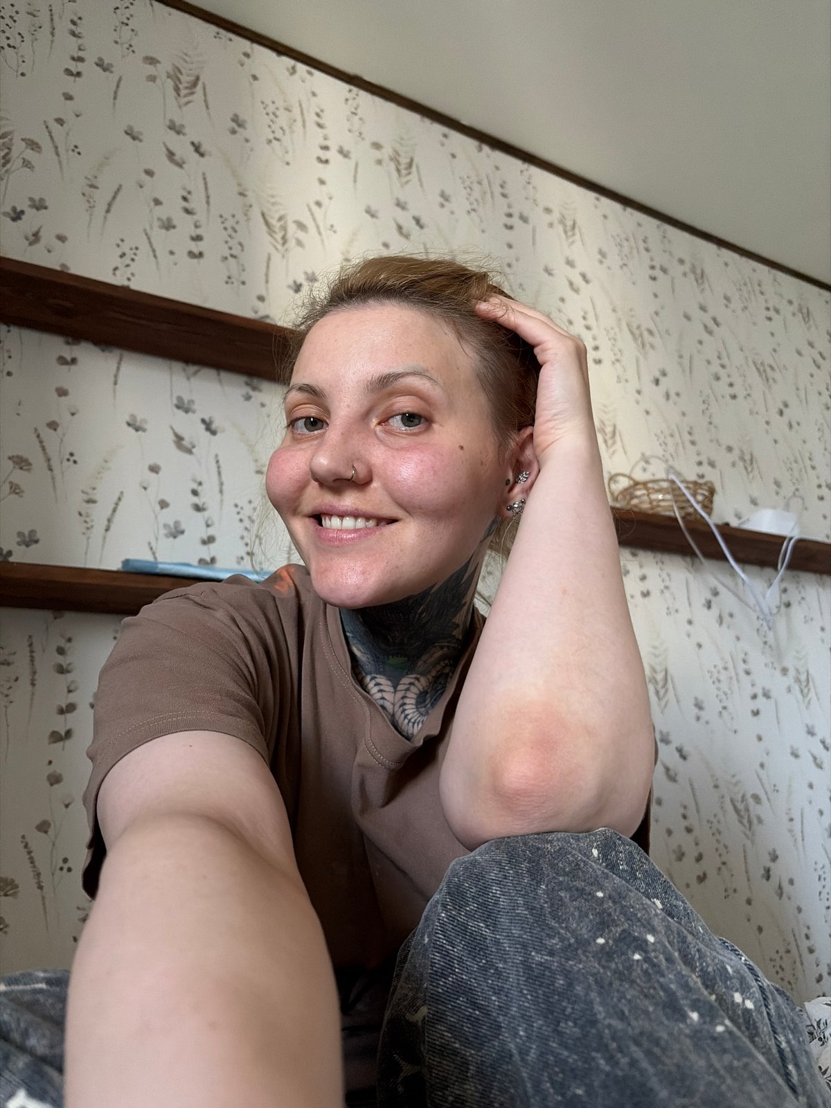 Woman takes selfie indoors in Chaikovsky, Russia