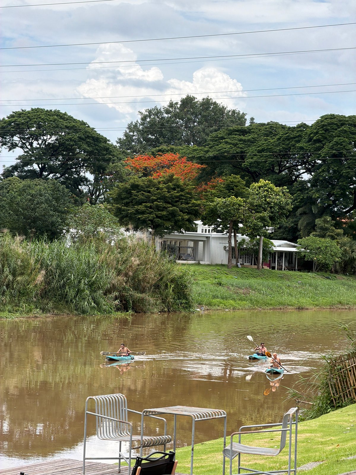 Early morning kayaking activity observed on Chiang Mai waterway