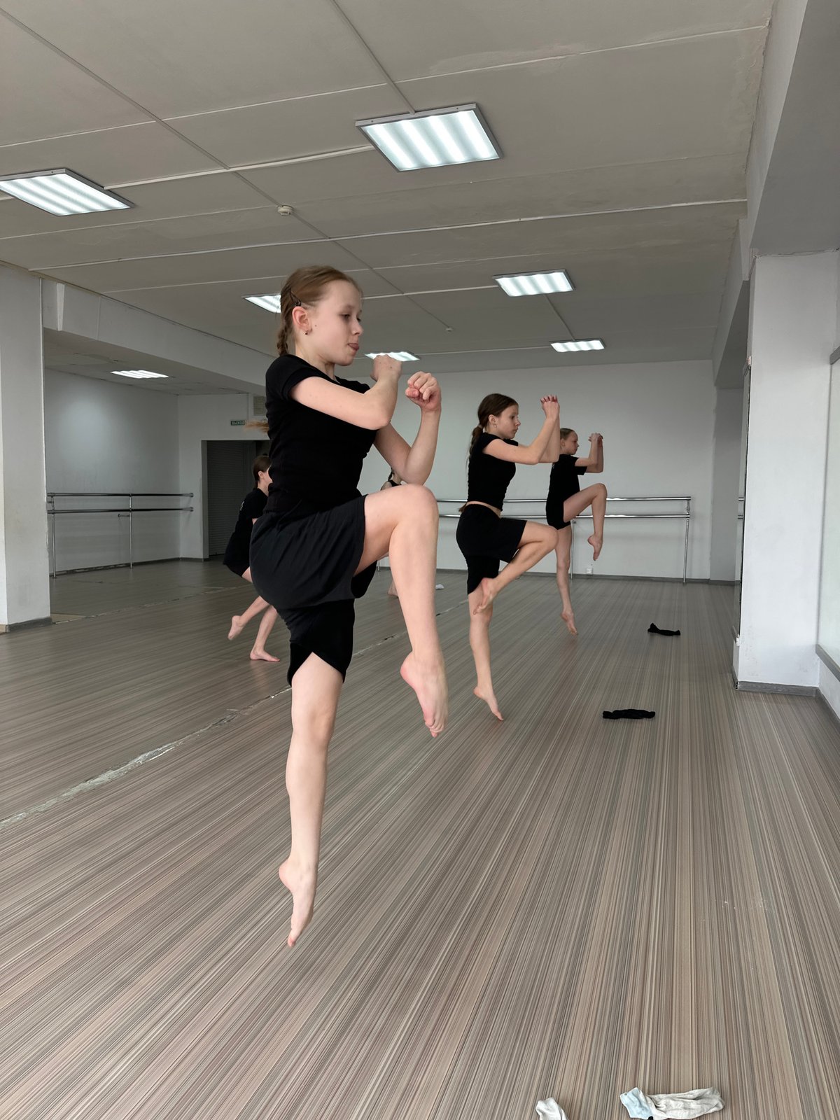Young dancers practice acrobatic routines at Votkinsk studio