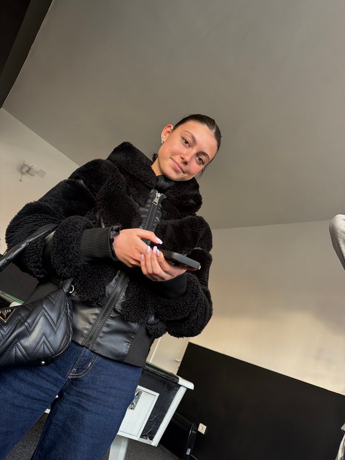 Young men take selfies near window in Veliki Preslav