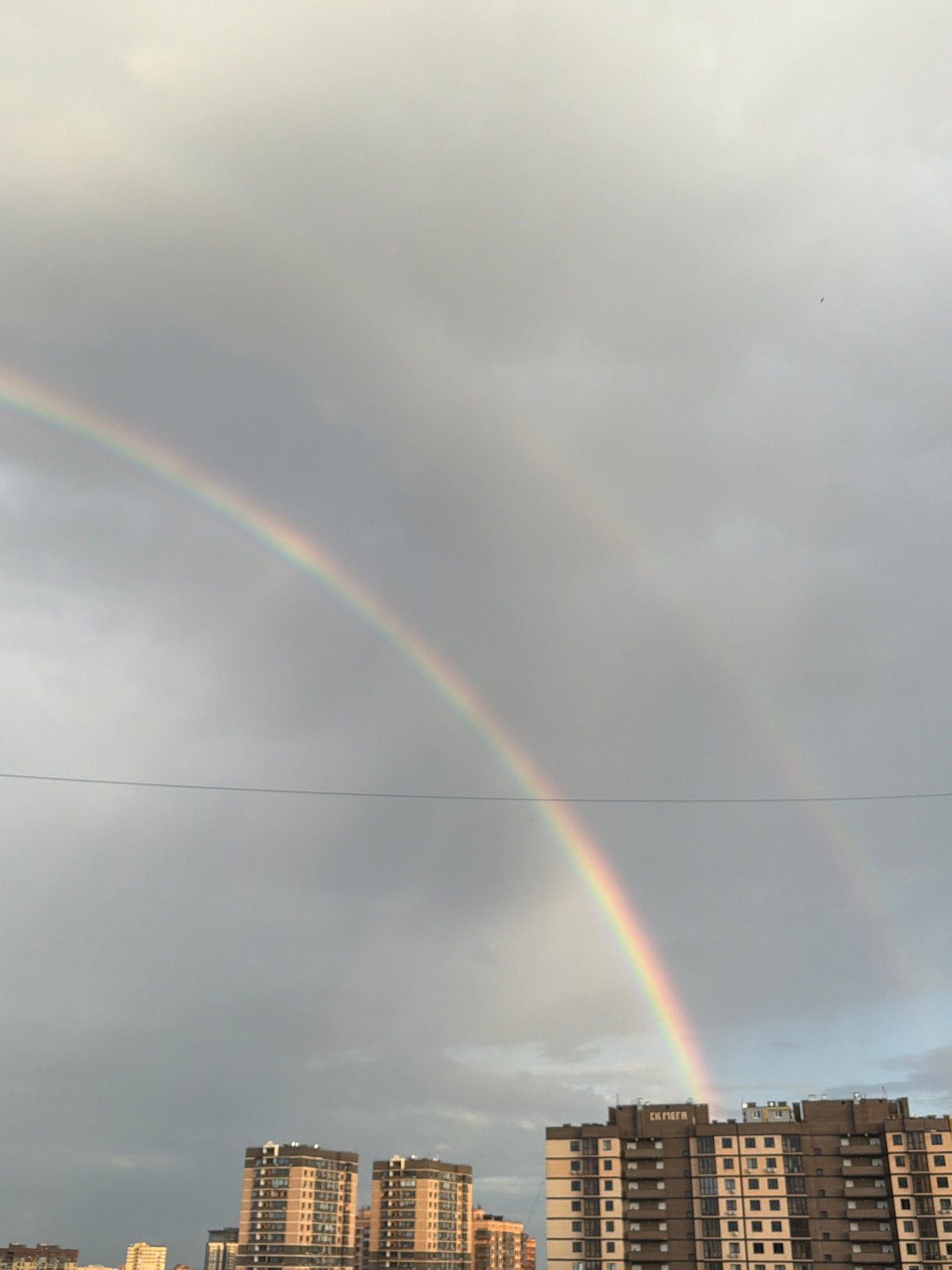Double rainbow appears over Ovoshchnoy apartment buildings