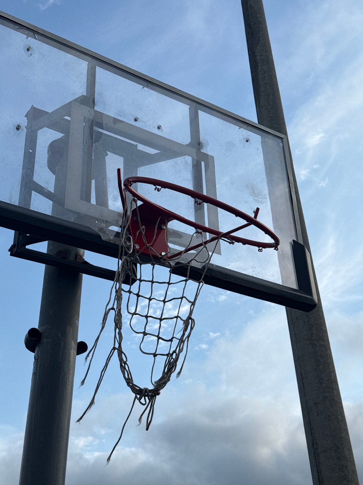 Playground hangout: hoops, rings, and climbing bars on a cloudy day