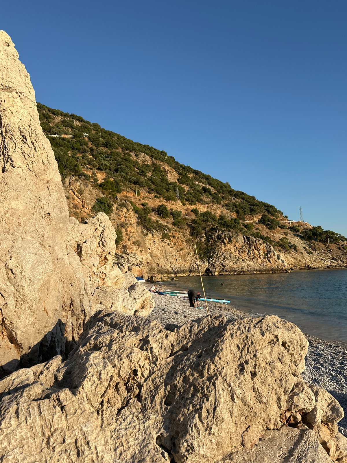 Afternoon beach life and paragliding captured in Fethiye Turkey