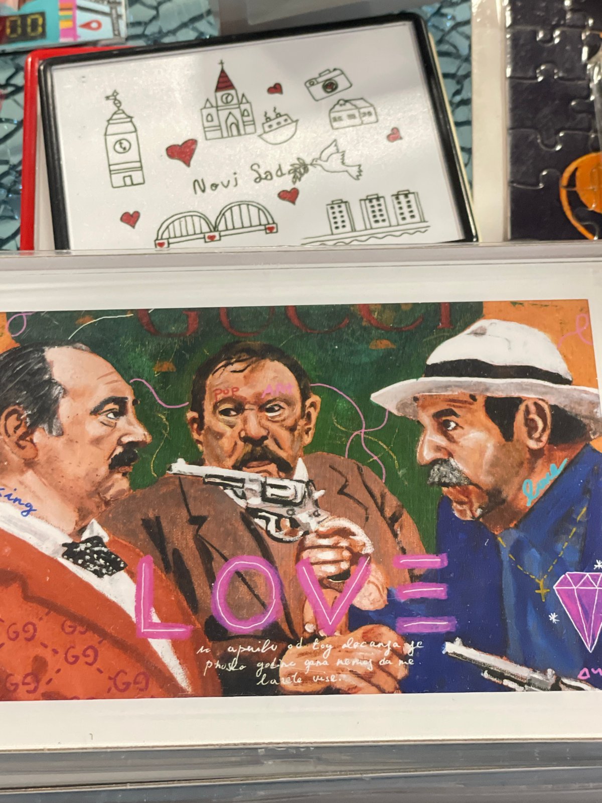 Art shop browsing session documented in Novi Sad, Serbia
