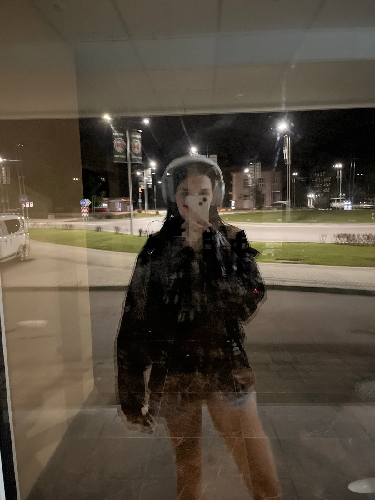 Night walk by a lit river, selfies and shadows along the way
