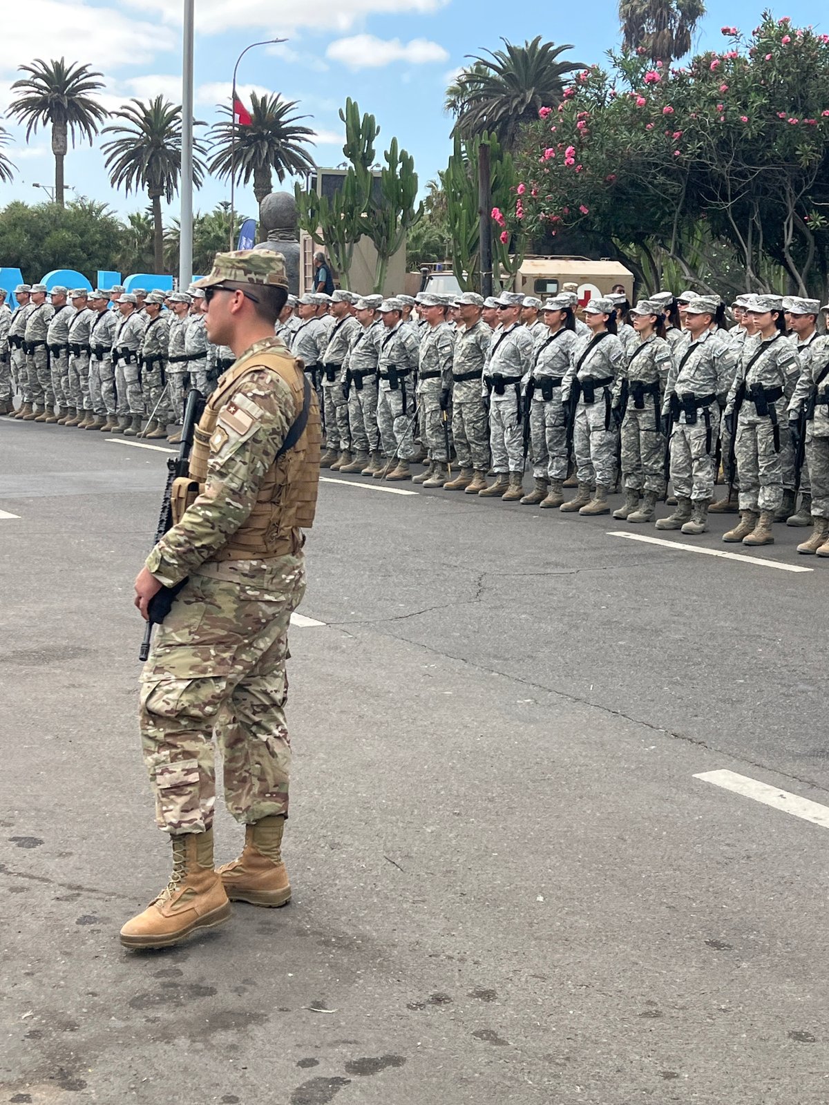 Military formation ceremony observed on Arica street near El Morro