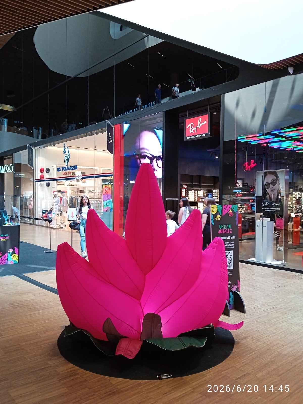 Porsche showroom, inflatable art, and Milan's modern skyline
