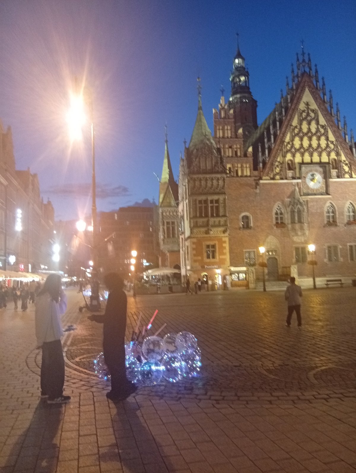 Wrocław's Market Square at dusk, dwarves and all