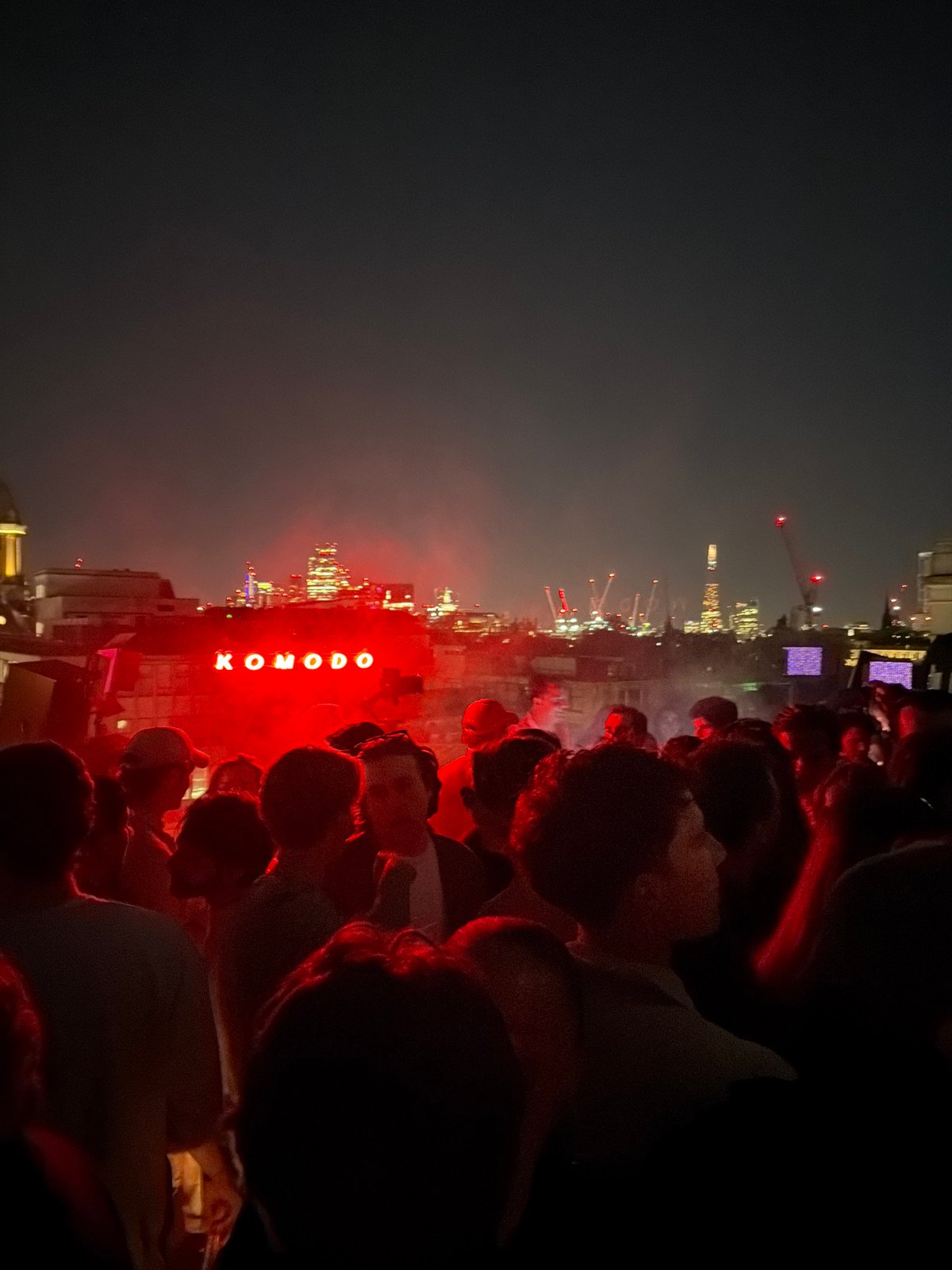 Crowd gathers to view London skyline at night
