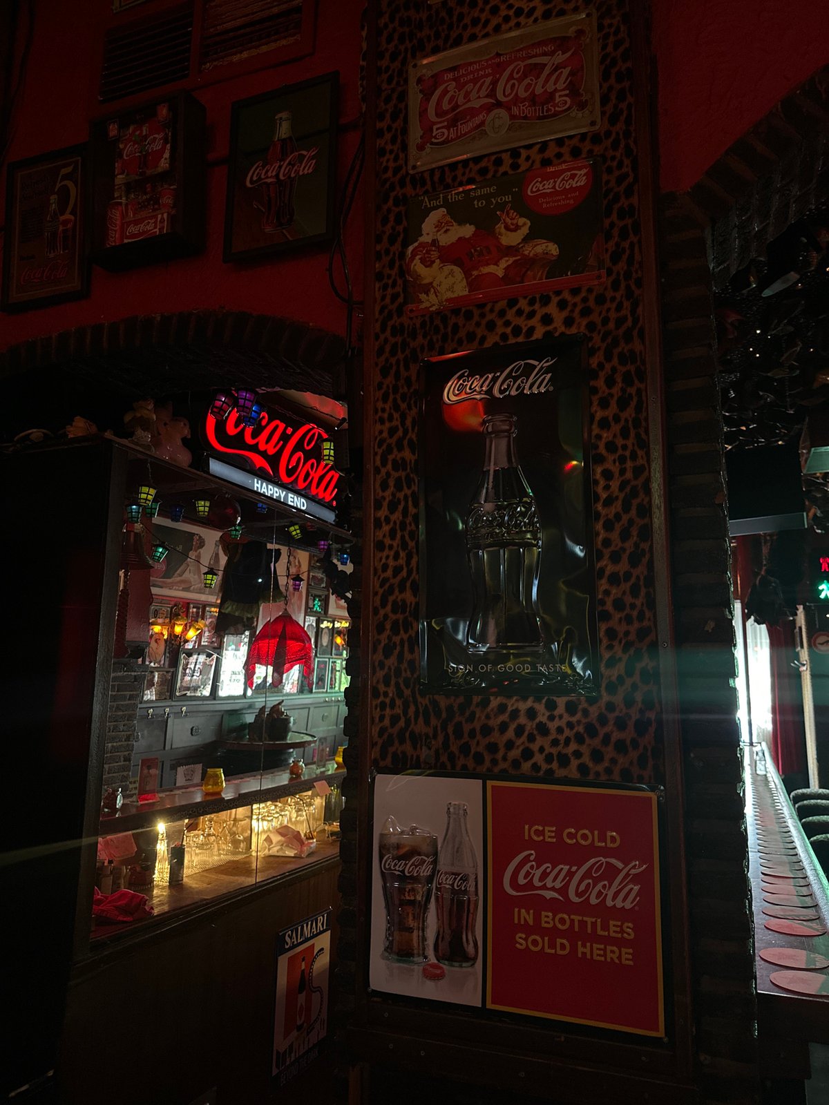 Inside a cluttered, kitschy themed bar in The Hague