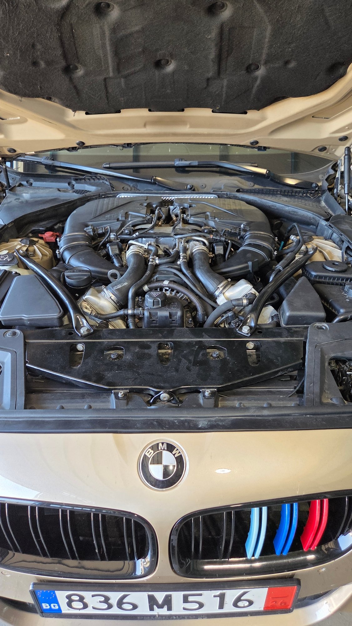 BMW performance car engine bay inspected in Burgas