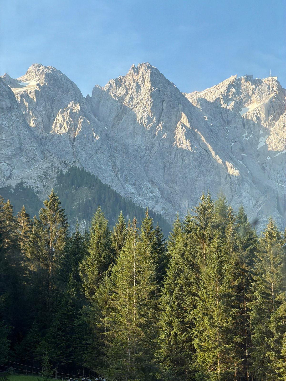Zugspitze at golden hour, Grainau forests below