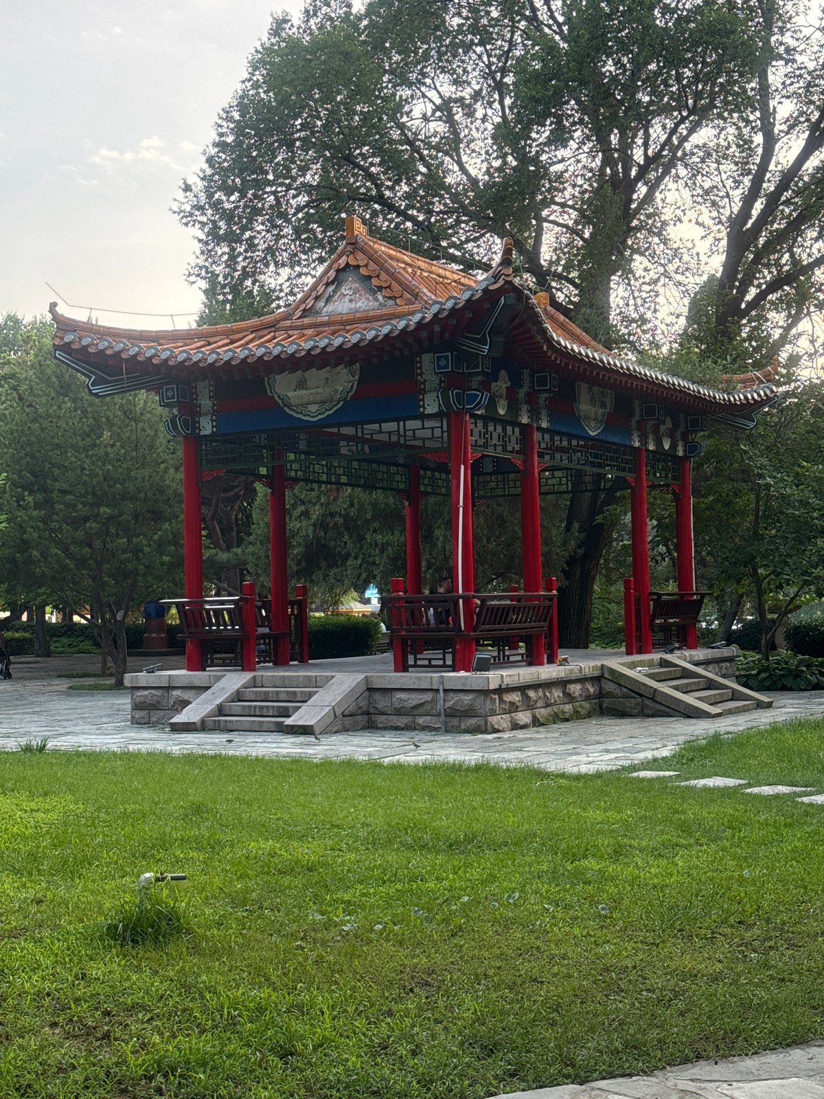Street life and landmarks across Qinhuangdao on a summer morning