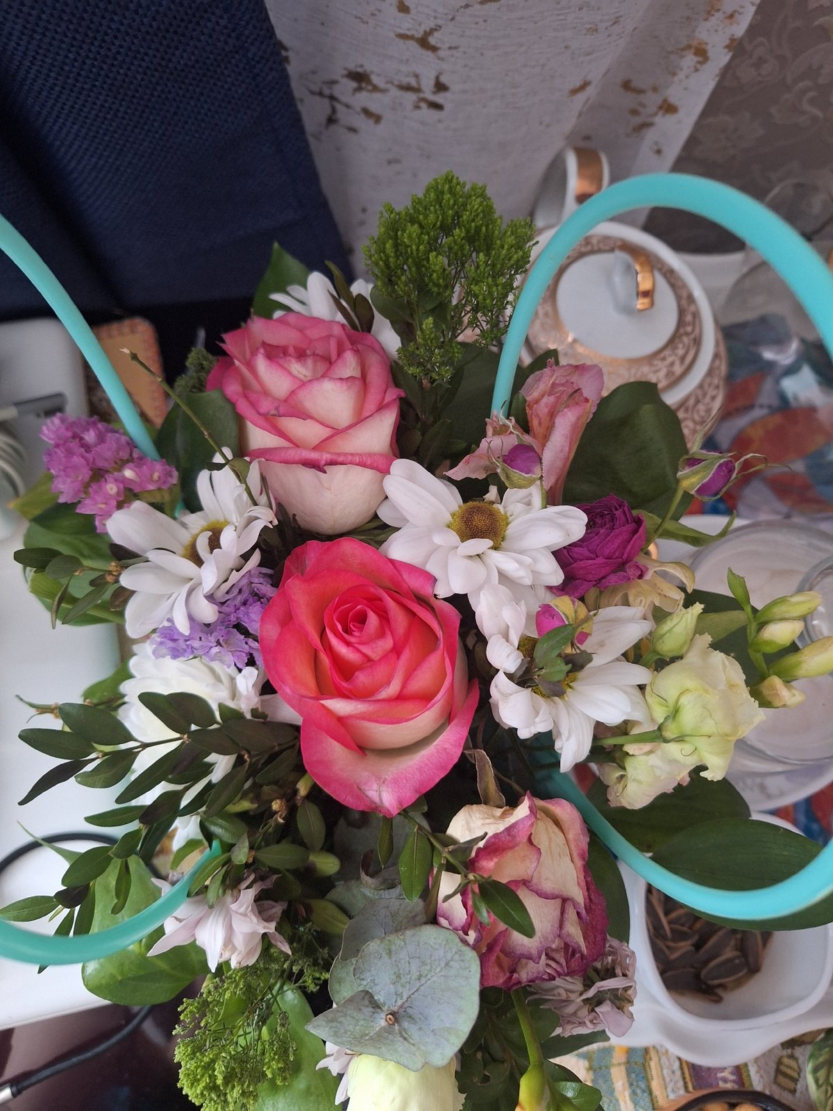 Floral arrangement with mixed flowers observed on Moscow table